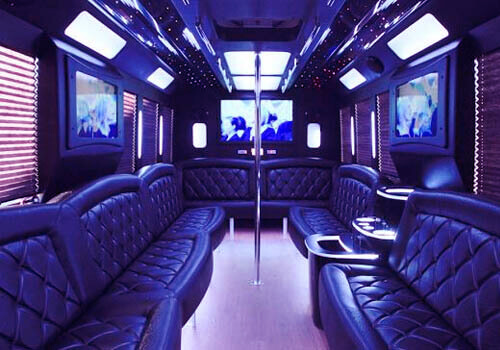 Party bus interior with dance poles