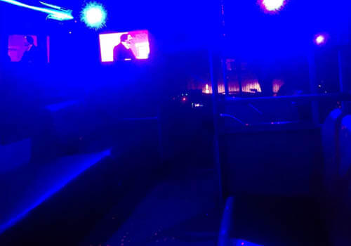 Party bus interior with laser lights
